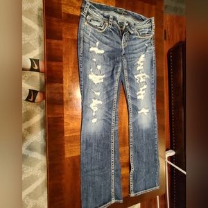 Women's Silver Jeans with holes